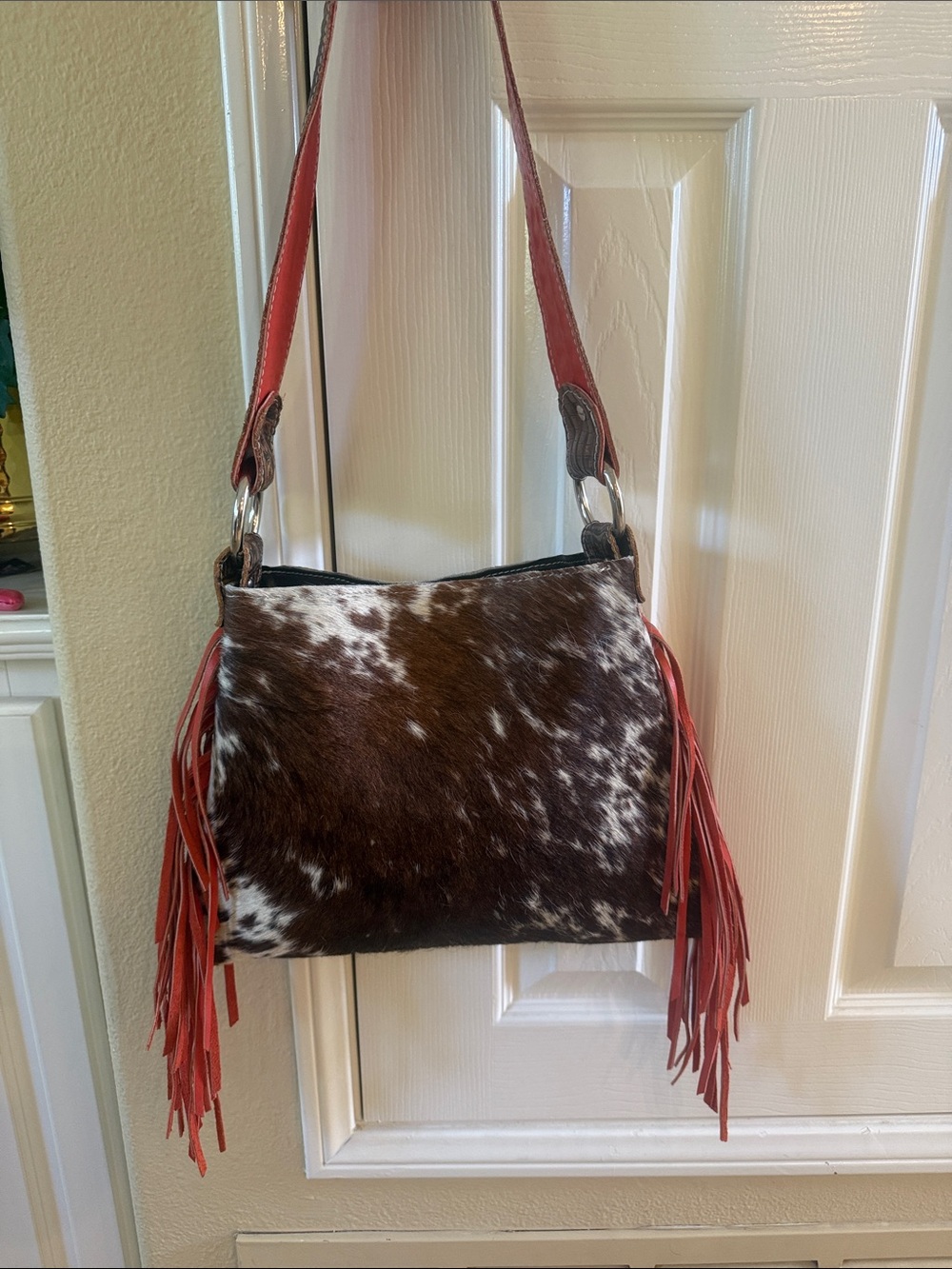 Cowhide Shoulder Bag in Brown & White with orange fringes saddle bag country